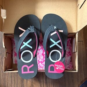 Roxy Black Flip Flops with Pink and Blue Accents
